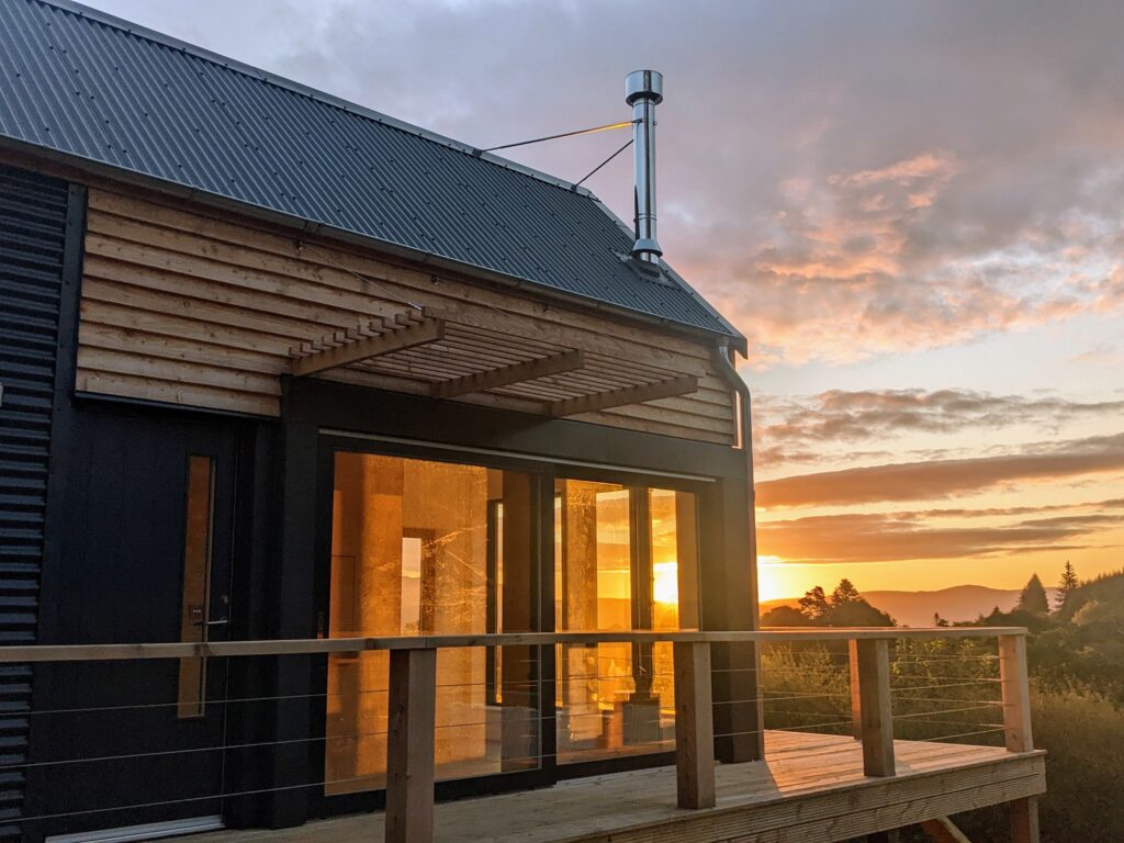 Glamping bothy with morning sunrise